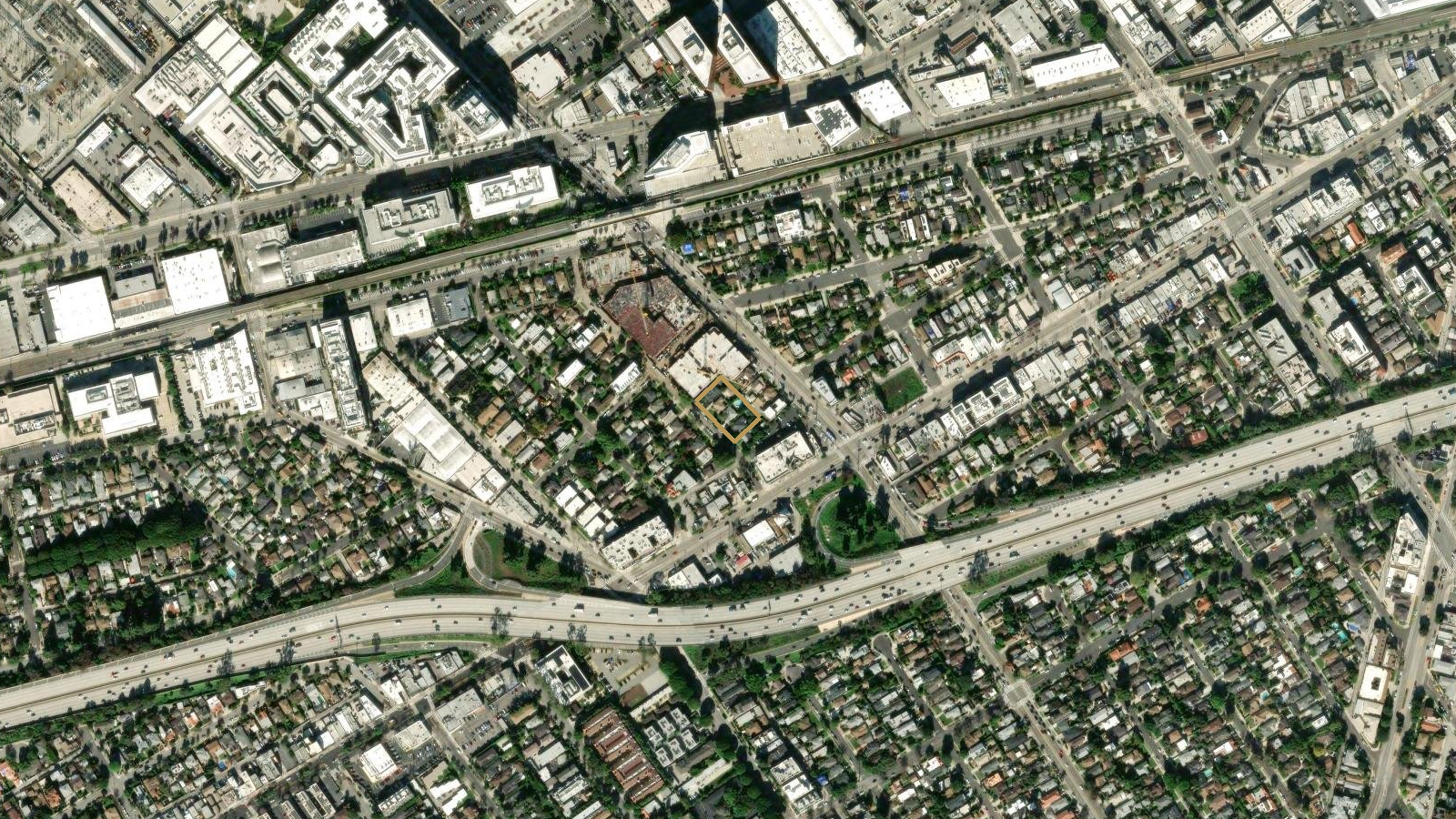 Neighborhood aerial with the site outlined