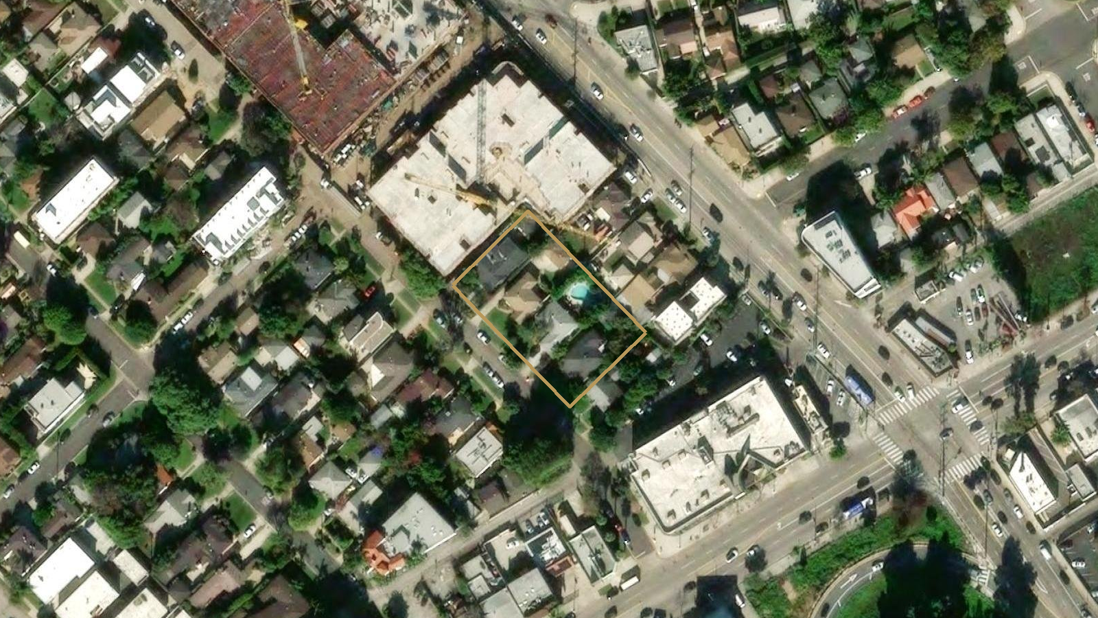 Aerial view of the four lots outlined in gold